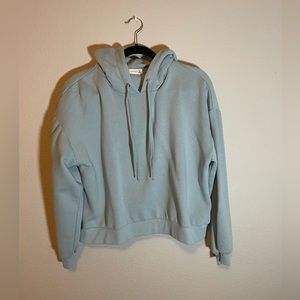 Light blue cropped hoodie, size large